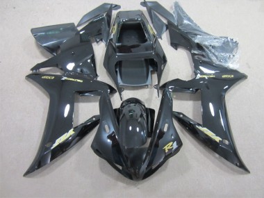 R1 02-03 - Negro con Oro Calcomanía